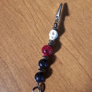 Multifunctional Clip With Skull Bead And Red and Sparkling Purple Beads